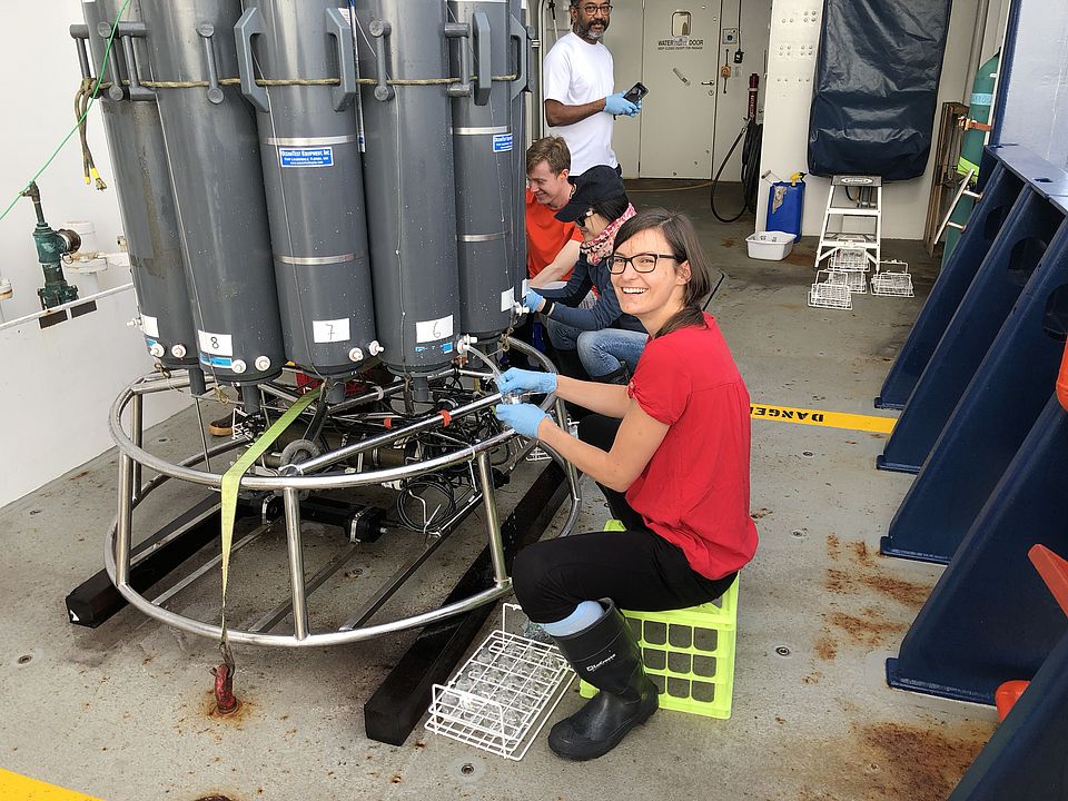 Claudia Frey collects water into serum bottles from the CTD rosette